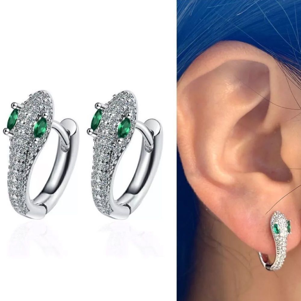 - The Serpentine Earring in 925 silver and cubic zirconia